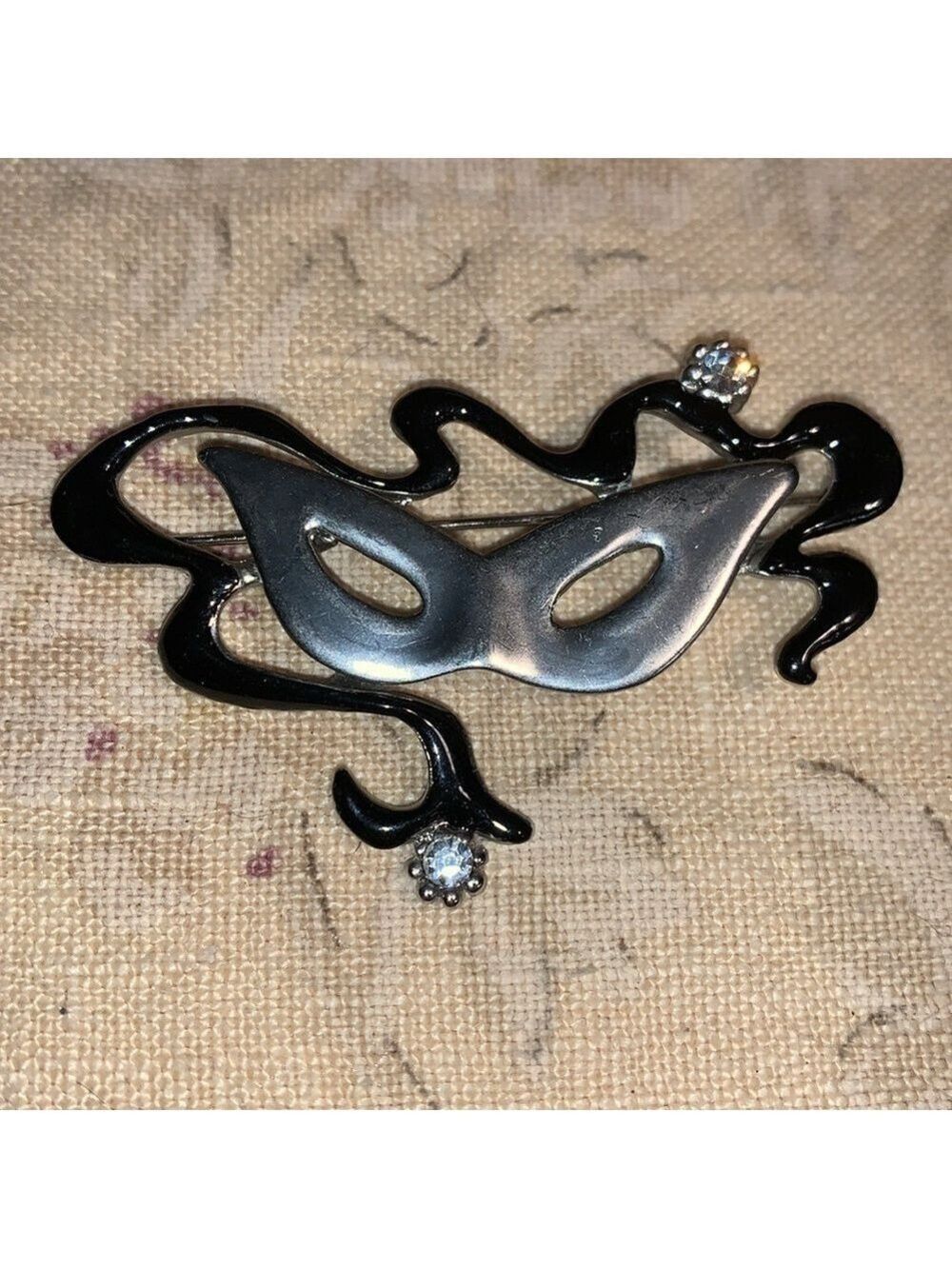 Masquerade brooch